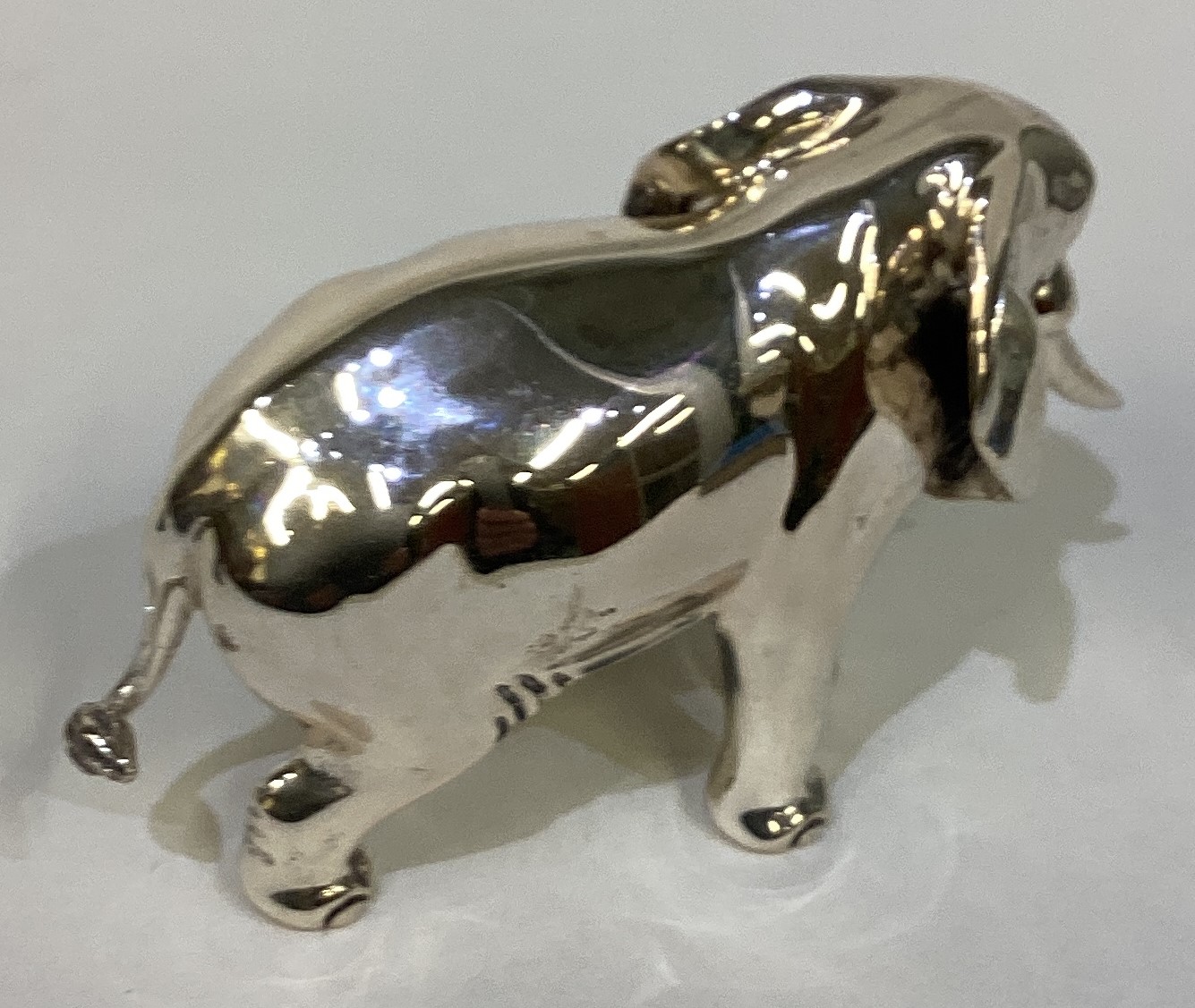 A rare silver figure of an elephant and calf. - Image 3 of 4