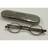 A pair of Victorian silver spectacles in case.