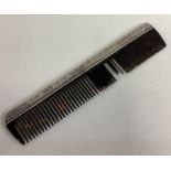 LIBERTY & CO: A silver comb.