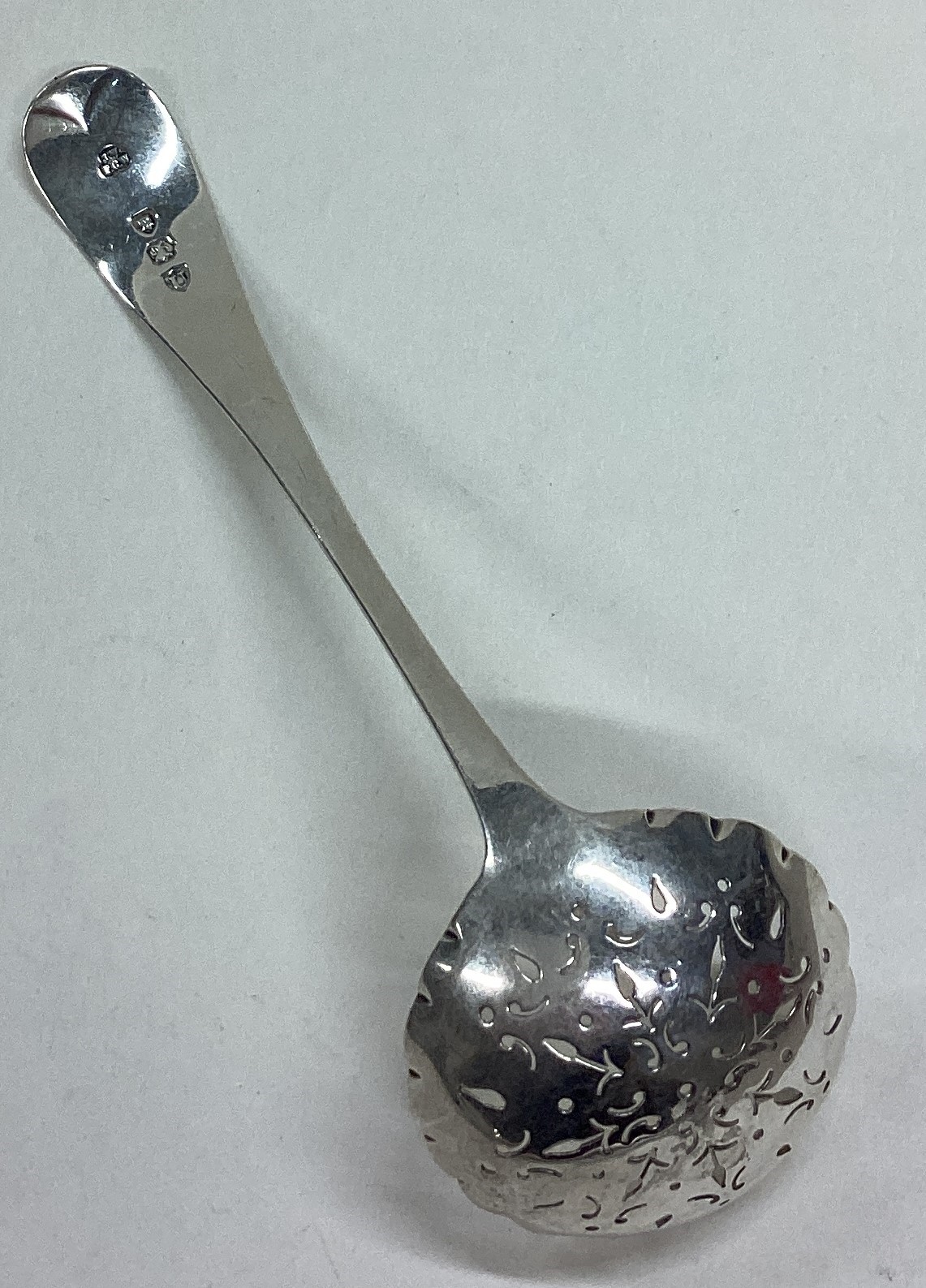 A Victorian silver ladle with pierced decoration. - Image 2 of 3