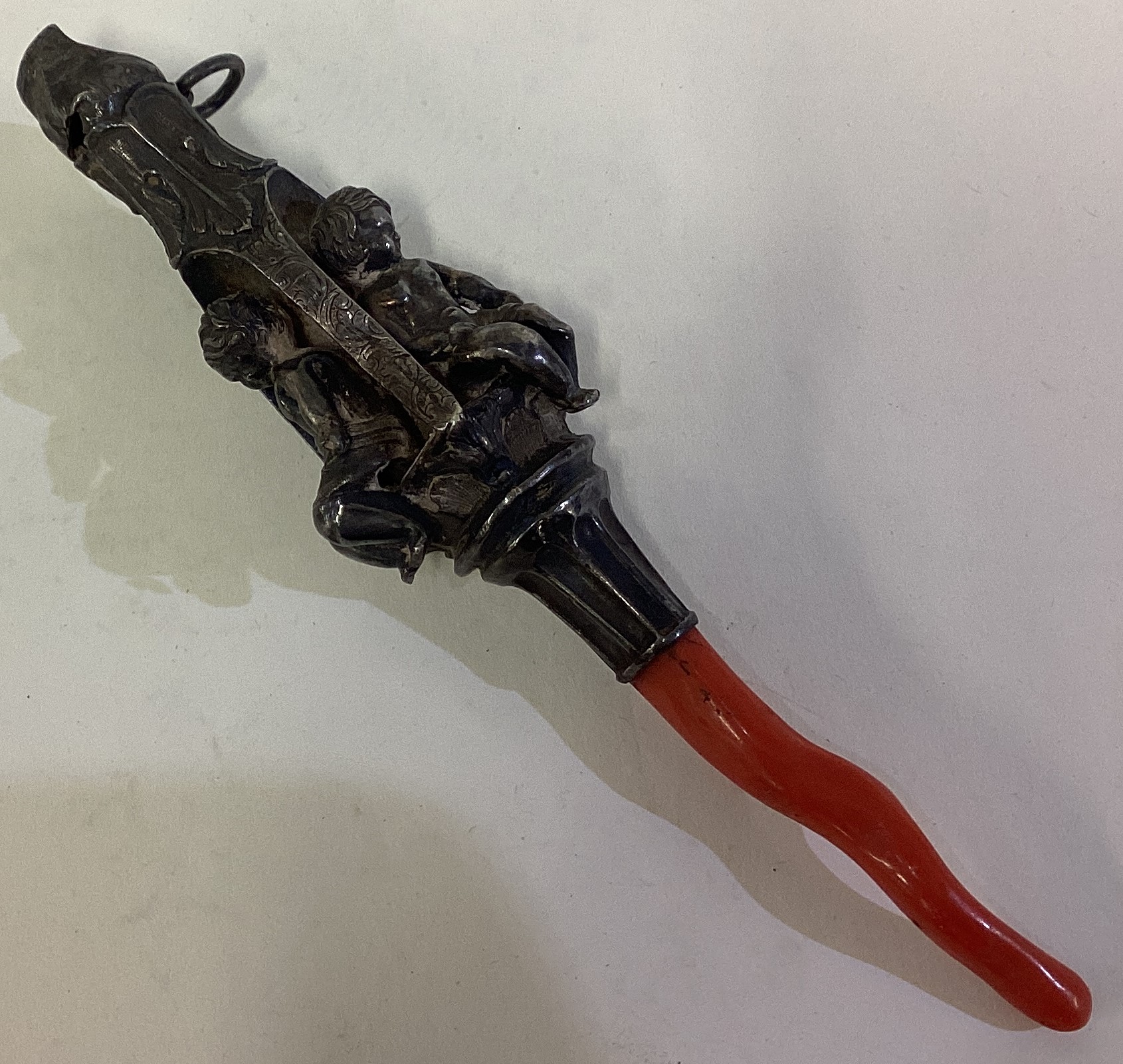 A rare and unusual Victorian silver figural rattle. - Image 2 of 2