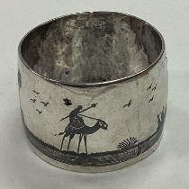 A Persian silver and Niello napkin ring.