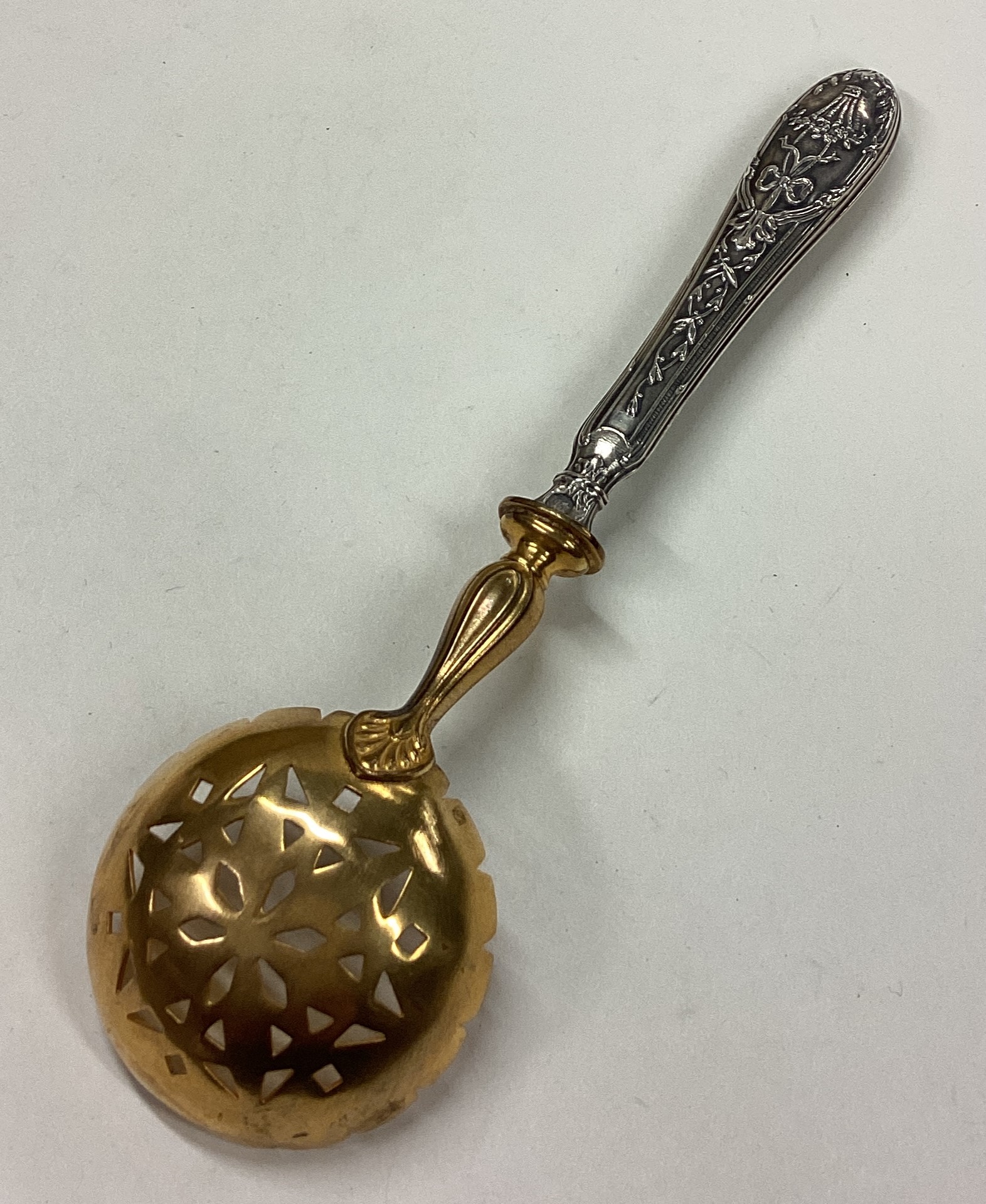 A cased French silver sifter spoon with pierced decoration. - Image 2 of 2