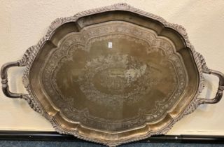 A heavy silver two handled silver tray decorated w