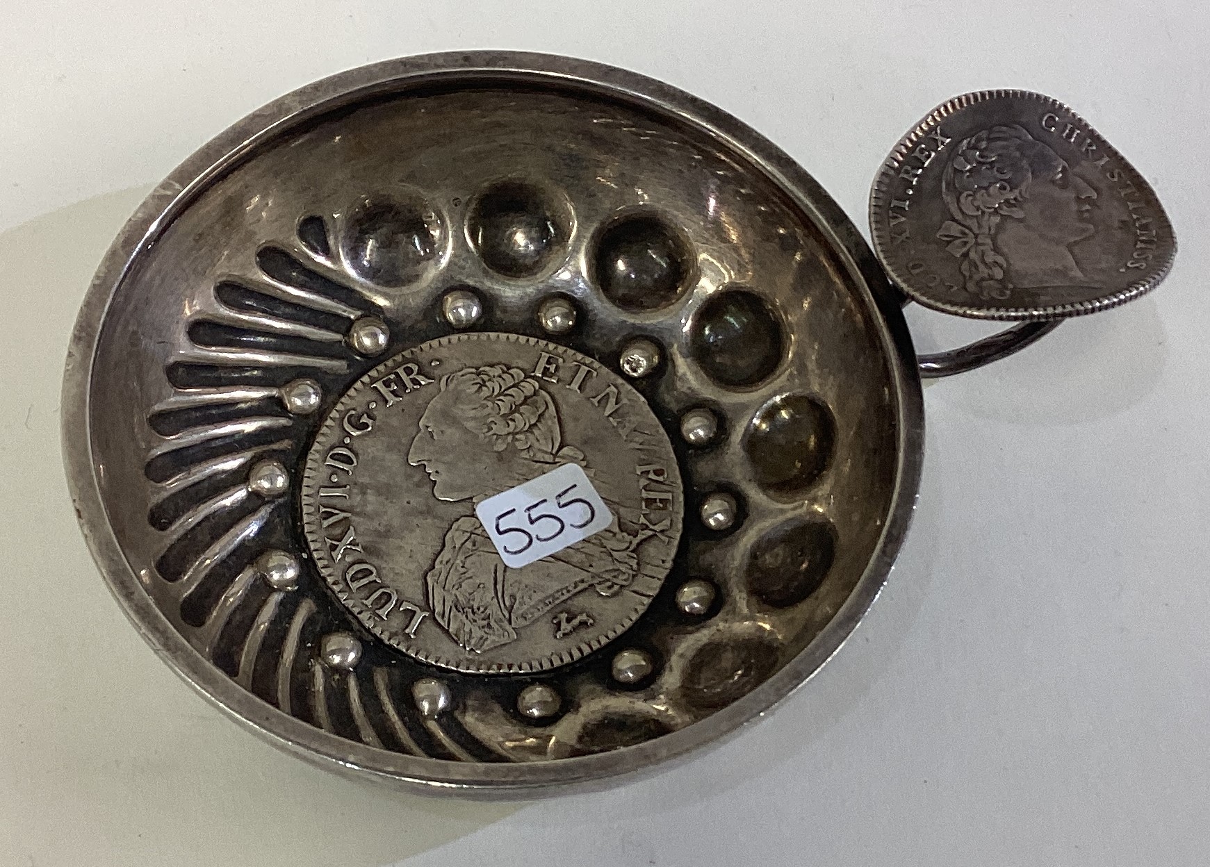 A 19th Century French silver wine taster with coin centre. - Image 2 of 3