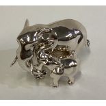 A rare silver figure of an elephant and calf.
