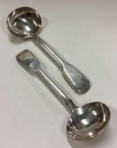 A pair of Victorian silver sauce ladles.