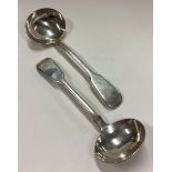 A pair of Victorian silver sauce ladles.