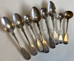 EXETER: A large collection of silver fiddle pattern teaspoons.