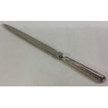 A silver letter opener. Sheffield 1997.