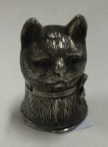 A silver vesta case in the form of a cat.
