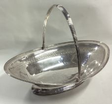 A large George III silver swing handled basket.