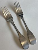 EXETER: An unusual pair of silver fiddle pattern dessert forks.