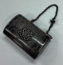 A Victorian silver combination snuff box / cigar cutter on suspension chain.