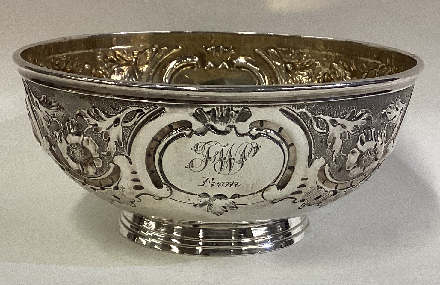 A Victorian silver bowl with chased decoration.