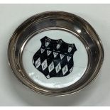 A silver mounted Carlton Ware dish with central armorial.