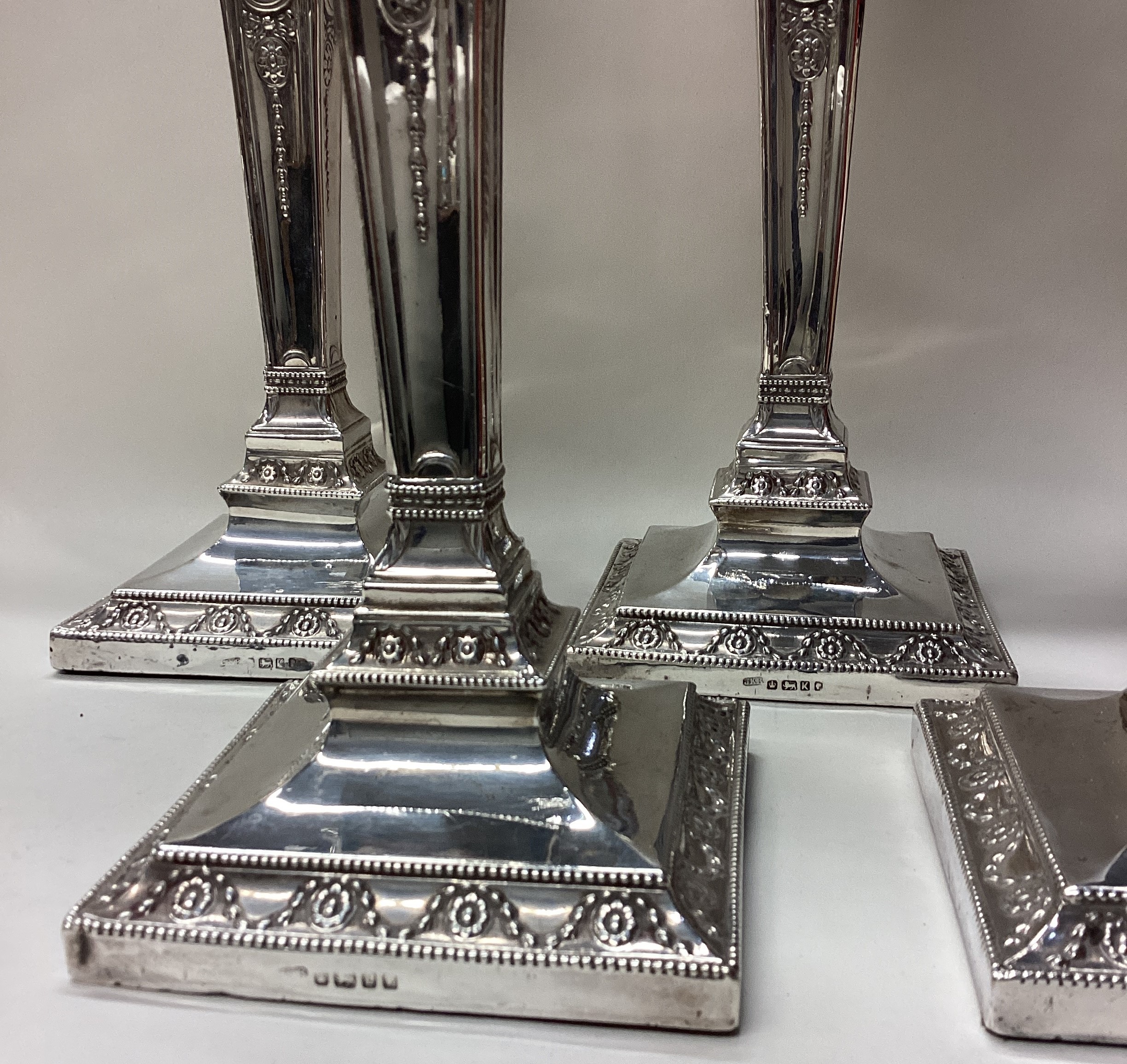 A rare and fine set of four Victorian silver candlesticks. - Image 3 of 5