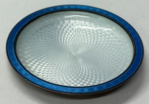 A Continental silver and enamelled dish.