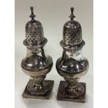 A pair of Victorian silver casters. 1892.