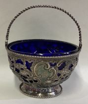 A fine and rare 18th Century George III silver swing handled basket.