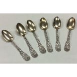 A set of six American silver spoons embossed with flowers and butterflies.