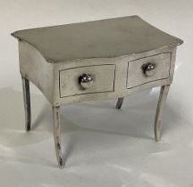 CHESTER: A silver jewellery box in the form of a dessing table.