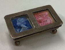 A silver double stamp case. Birmingham 1909.