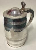 A fine George III silver lidded tankard of barrelled form.