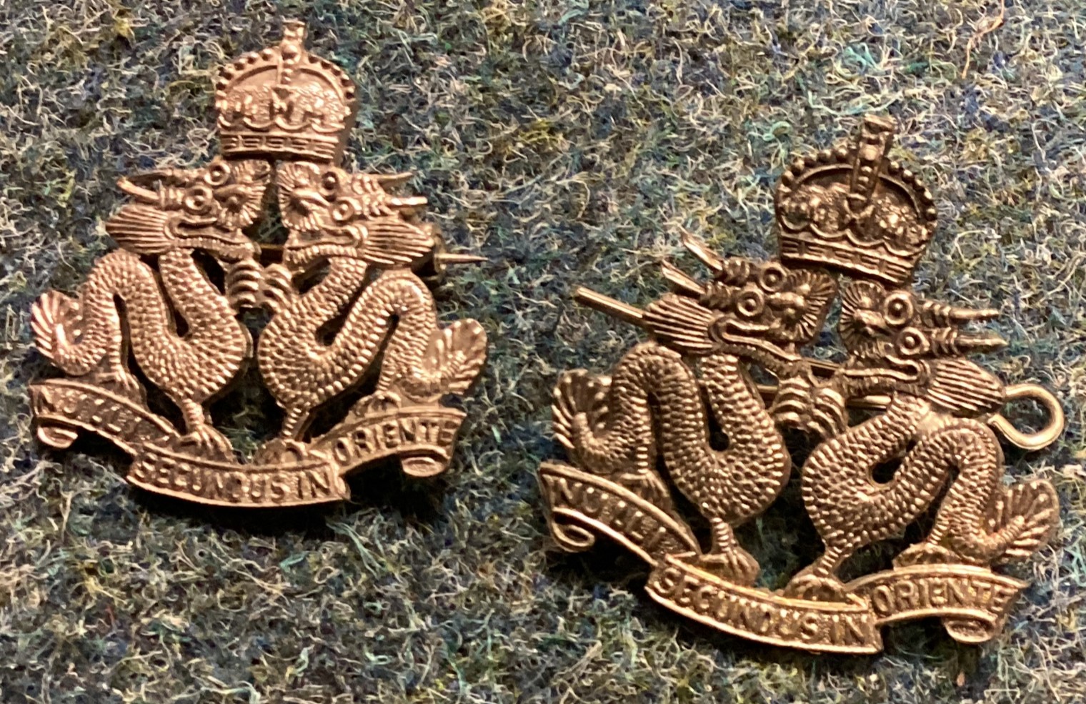 A pair of Chinese silver police badges.