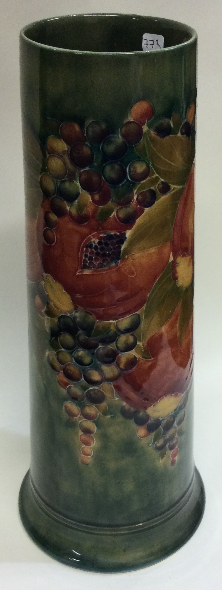 WILLIAM MOORCROFT: A tall "Pomegranate" spill vase on mottled green ground. Made for Liberty & Co. - Image 4 of 5