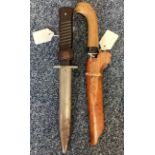 A WW2 knife together with an Eastern dagger.