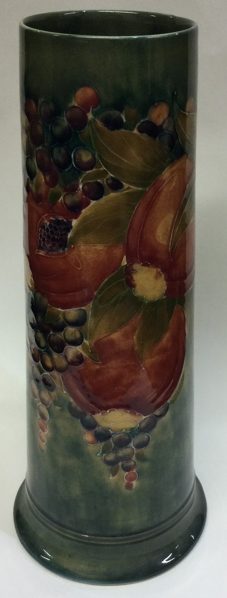 WILLIAM MOORCROFT: A tall "Pomegranate" spill vase on mottled green ground. Made for Liberty & Co. - Image 2 of 5