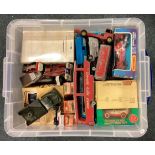 A box containing Dinky, Matchbox and other toys.