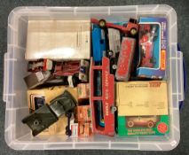 A box containing Dinky, Matchbox and other toys.