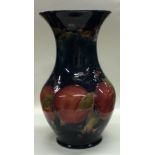 WILLIAM MOORCROFT: A large "Pomegranate" vase. Stamped Burslem.