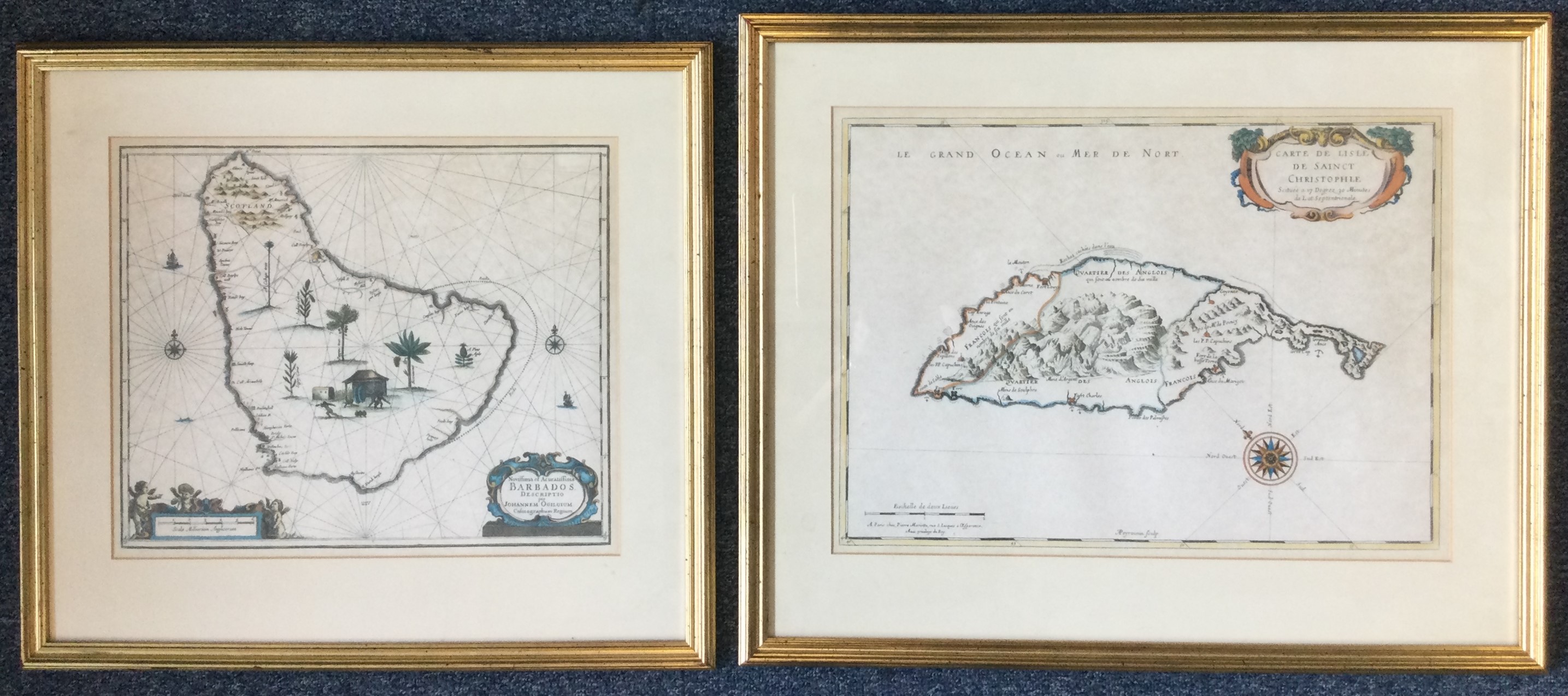 A pair of gilt framed reproduction maps. Est. £20 - £30.