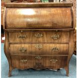 A Victorian mahogany cylinder top bureau.