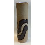 A tall stoneware vase with retro style impressed g