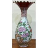 A large Chinese floral baluster shaped vase with shaped rim.