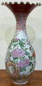 A large Chinese floral baluster shaped vase with shaped rim.