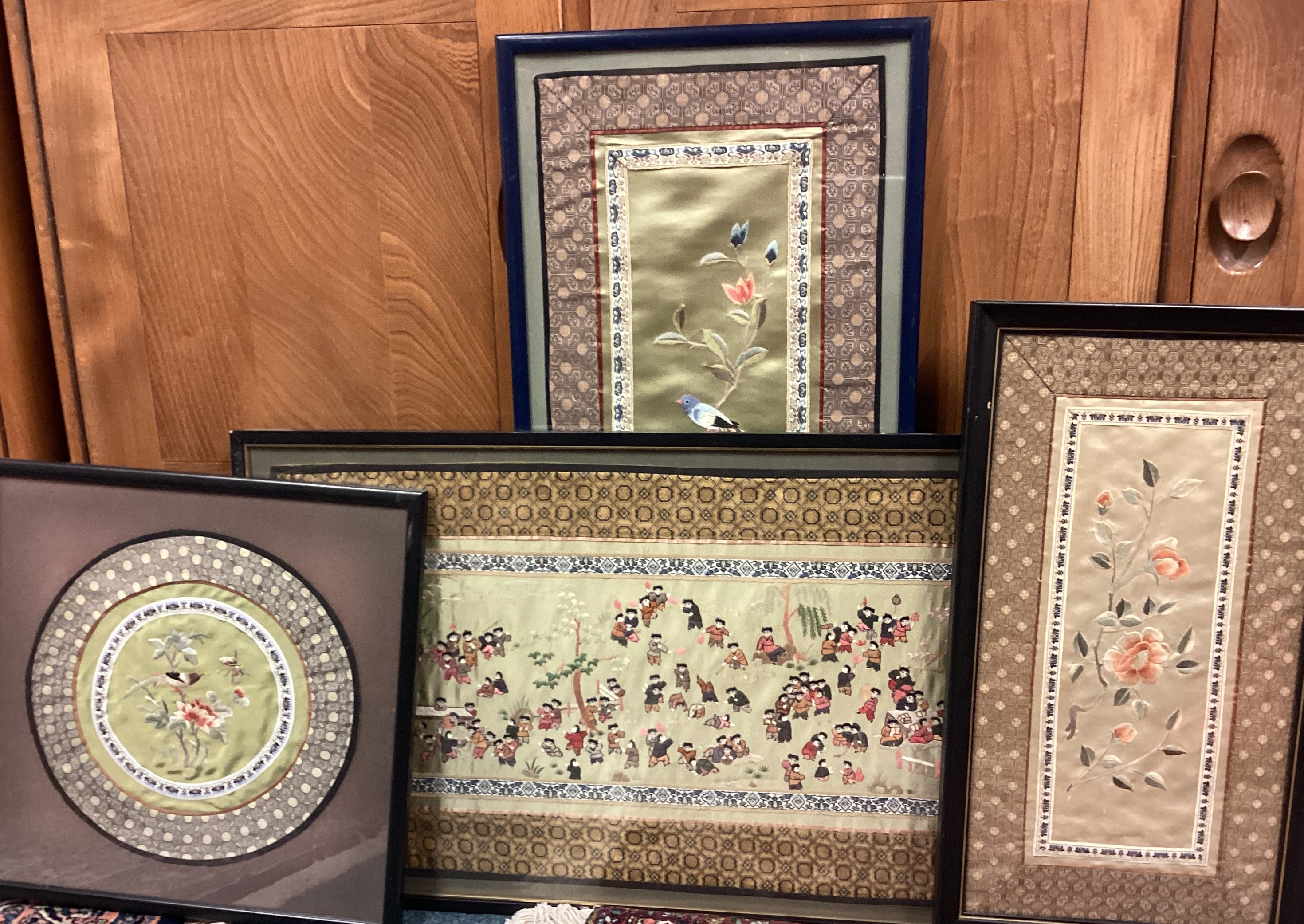 A collection of four framed and glazed samplers.