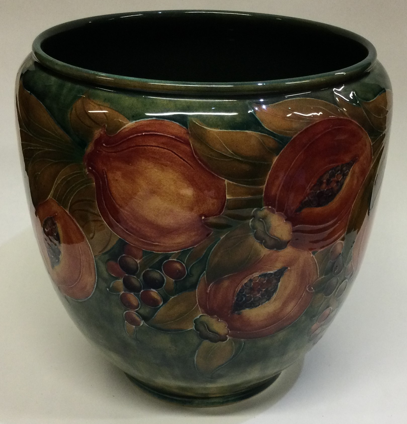 WILLIAM MOORCROFT: An early "Pomegranate" bowl on mottled green ground. - Image 6 of 8