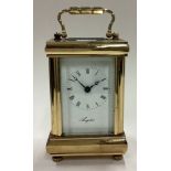 A good brass miniature carriage clock.