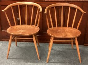 ERCOL: Two stick back chairs. Est. £40 - £60.