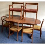 A large retro table and six chairs.