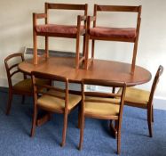 A large retro table and six chairs.