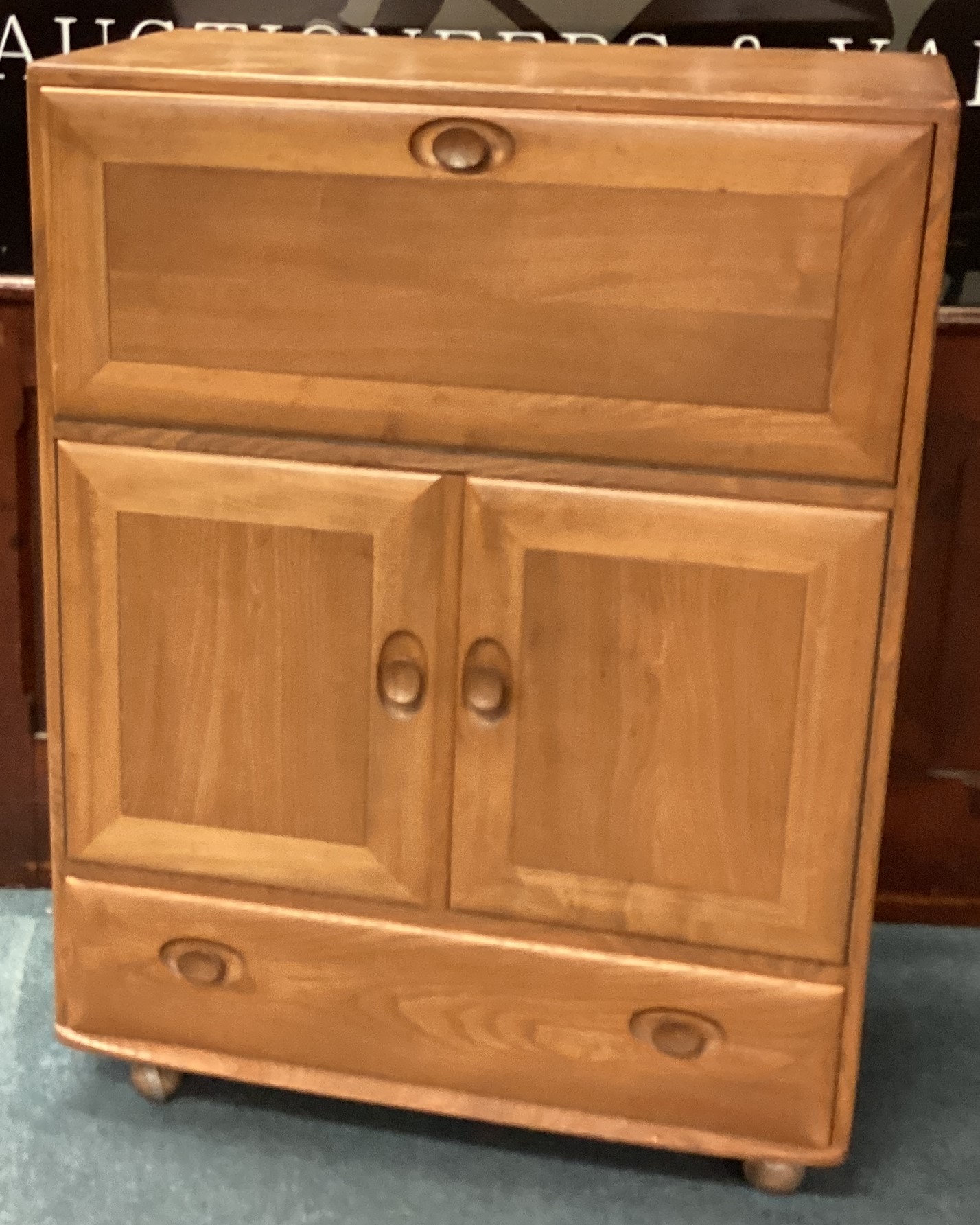 ERCOL: A good drop flap cupboard with single drawer. - Image 2 of 2