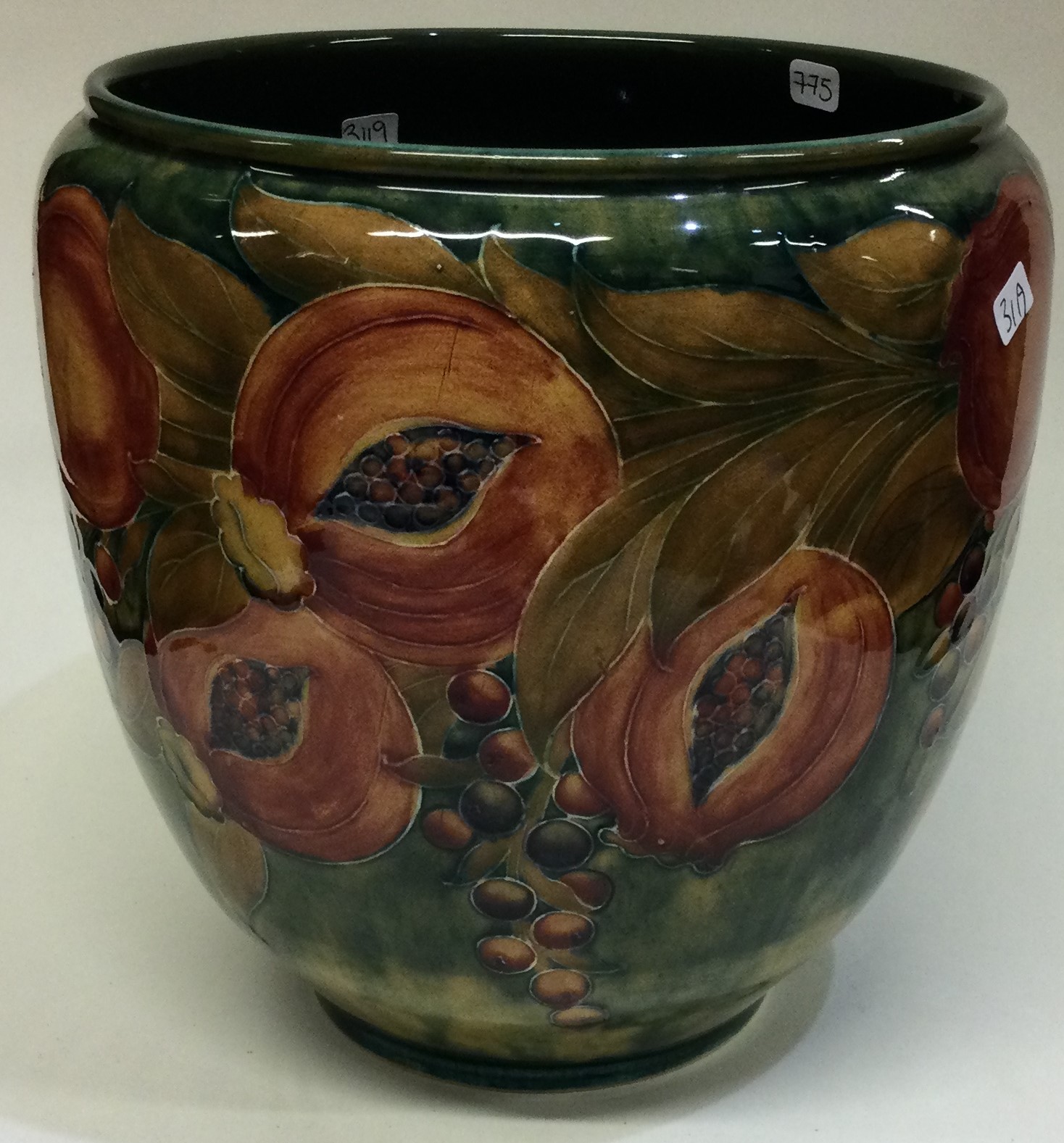 WILLIAM MOORCROFT: An early "Pomegranate" bowl on mottled green ground. - Image 2 of 8