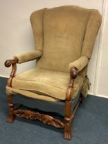 A large Continental wingback chair.