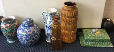 A collection of studio pottery and other vases.